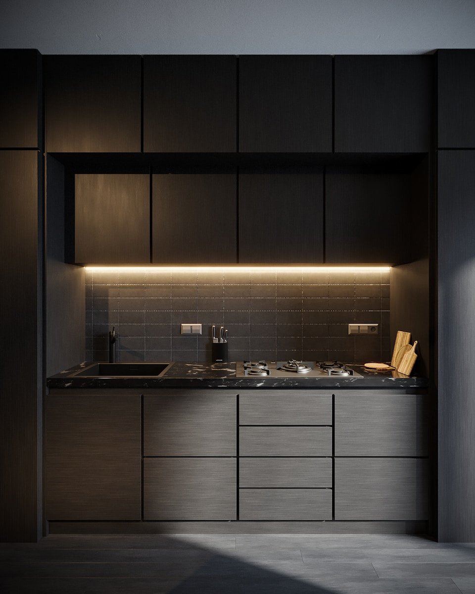 a kitchen with a sink and cabinets