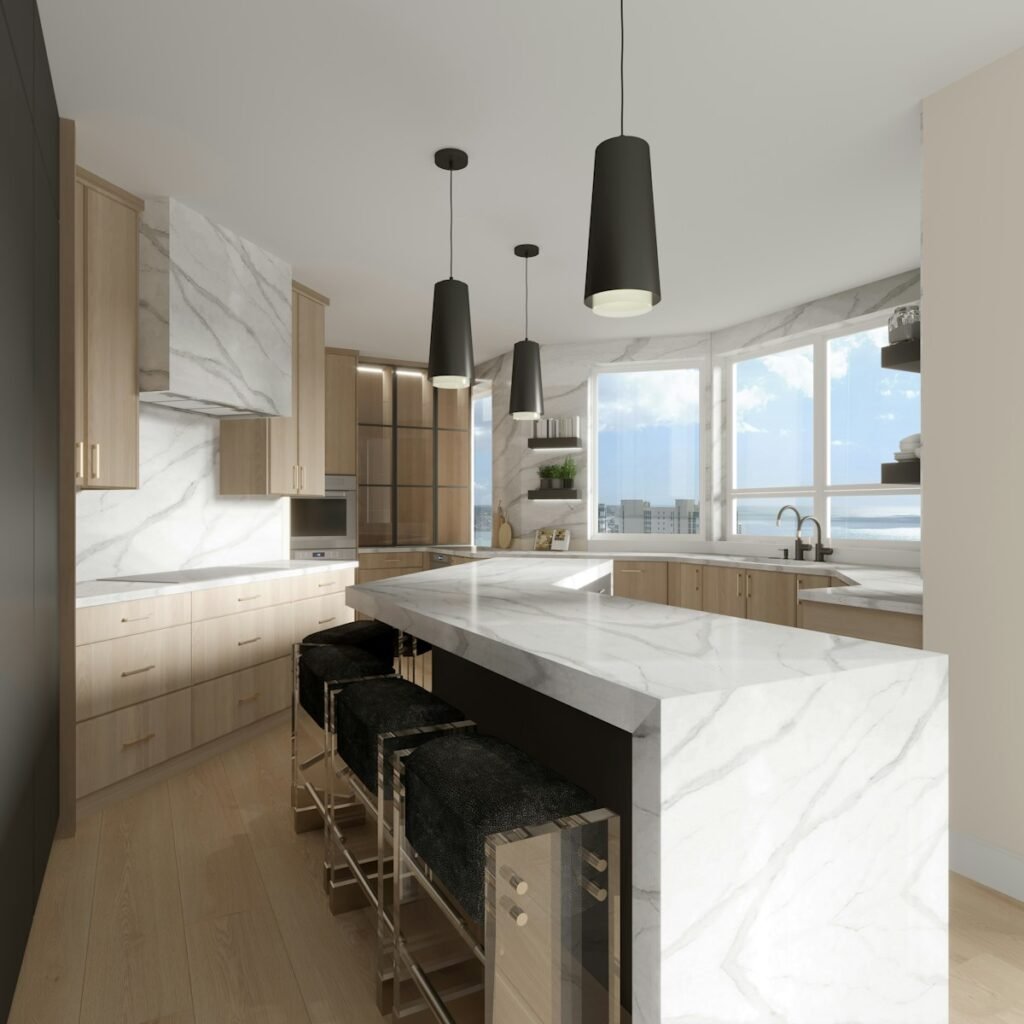 a large kitchen with a marble counter top